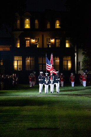 The Official Color Guard of the Marine Corps marches on during the Friday Evening Parade at Marine Barracks Washington, July 16, 2021.
