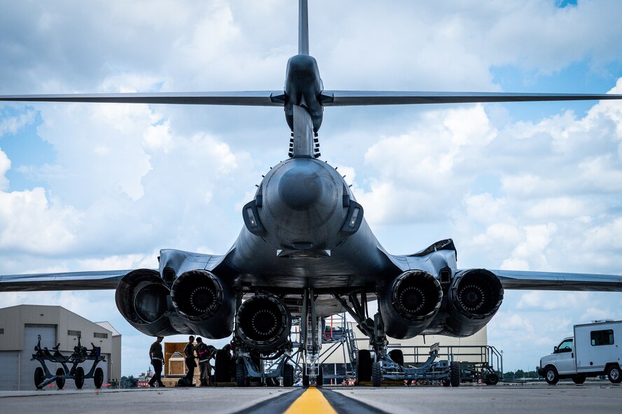 Airmen from Dyess Air Force Base, Texas remove an engine from a B-1B Lancer at Barksdale Air Force Base, Louisiana, July 7, 2021.