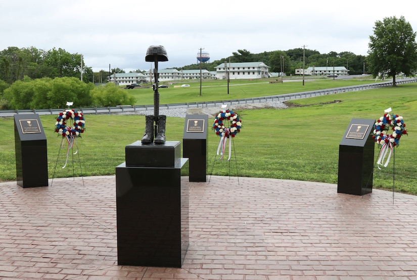 Family, friends and fellow Soldiers of three Pennsylvania National Guardsmen killed in Afghanistan in 2011 gathered at Fort Indiantown Gap to dedicate a memorial in their honor July 18. The dedication took place exactly ten years after the convoy carrying Staff Sgt. Kenneth VanGiesen, Staff Sgt. Brian Mowery, and Sgt. Edward Koehler III, all with the 131st Transportation Company, 213th Regional Support Group, Pennsylvania National Guard, was attacked with an improvised explosive device, killing all three and injuring two others. (U.S. Army National Guard photo by Staff Sgt. Zane Craig)