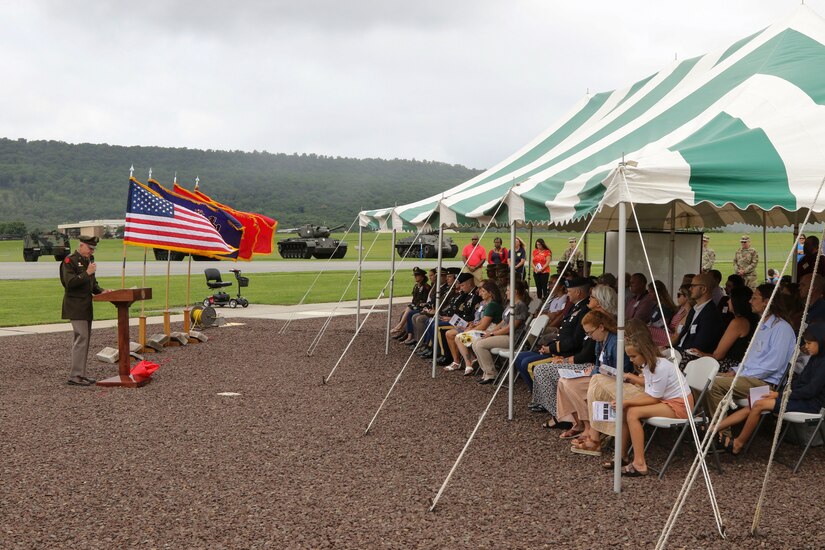 Maj. Gen. Mark Schindler, Pennsylvania’s adjutant general, speaks July 18 at the memorial dedication at Fort Indiantown Gap honoring three Soldiers killed in action. The dedication took place exactly ten years after the convoy carrying Staff Sgt. Kenneth VanGiesen, Staff Sgt. Brian Mowery, and Sgt. Edward Koehler III was attacked with an improvised explosive device, killing all three and injuring two others. (U.S. Army National Guard photo by Staff Sgt. Zane Craig)