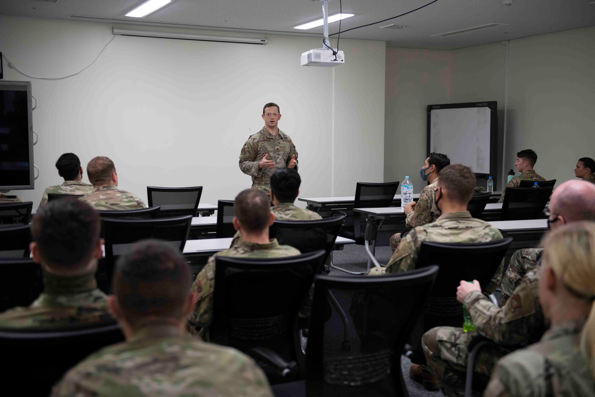 Maj. Matthew Stillman, 374th Security Forces Squadron commander, briefs volunteer Airmen before the start of a 374th Mission Support Group training day at Yokota Air Base, Japan, July 21, 2021.