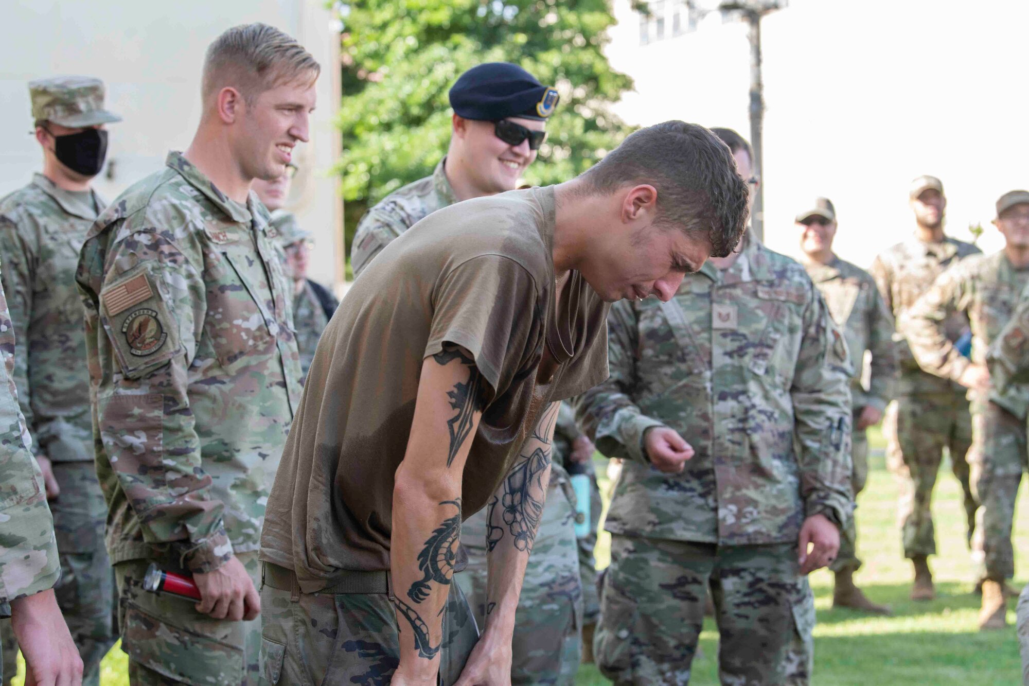 Senior Airman Dakota Blaylock, 374th Logistics Readiness Squadron combat mobility operations technician, recovers after oleoresin capsicum spray during a 374th Mission Support Group training day at Yokota Air Base, Japan, July 21, 2021.