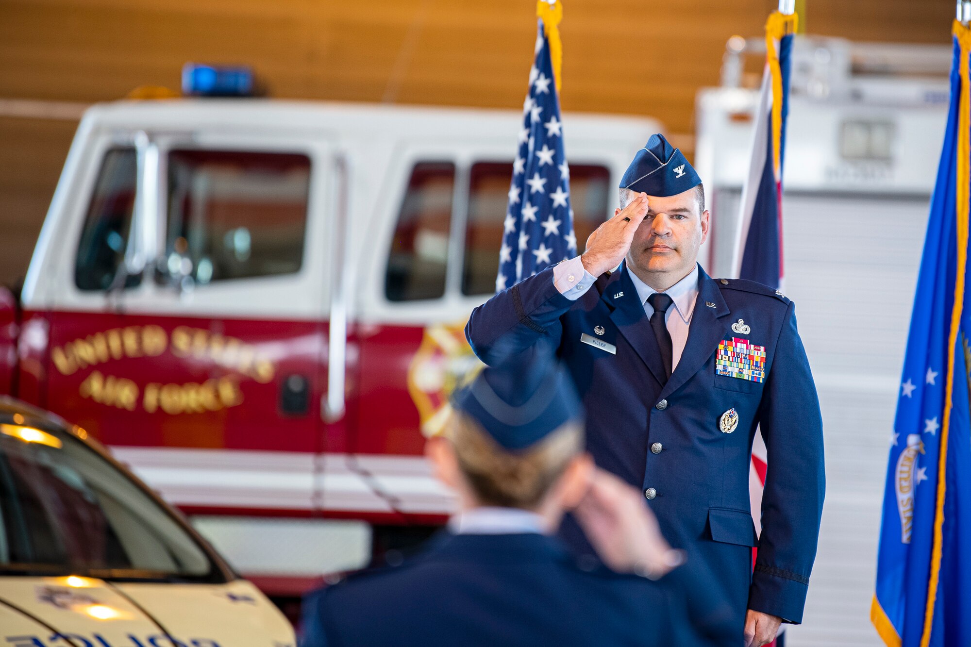 U.S. Air Force Col. Brian Filler, 501st Combat Support Wing incoming commander, renders a first salute during a change of command ceremony at RAF Alconbury, England, July 20, 2021. Prior to assuming command of the 501st CSW, Filler served as the Vice commander of the 39th Air Base Wing, Incirlik Air Base, Turkey.  (U.S. Air Force photo by Senior Airman Eugene Oliver)