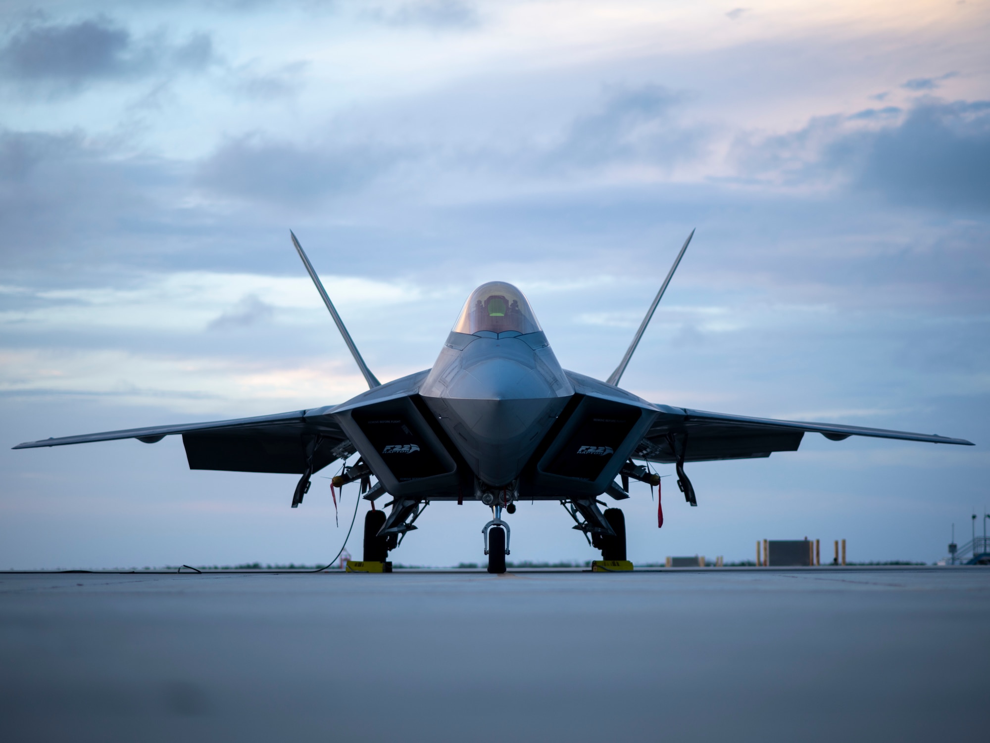 A U.S. Air Force F-22 Raptor sits on the flight line.