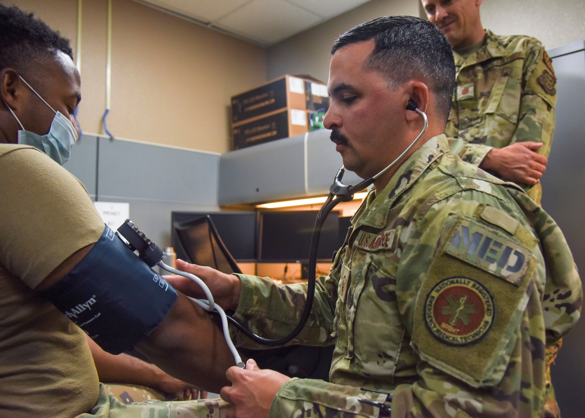 U.S. Air Force Tech Sgt. Daniel Beauchamp 912th Air Refueling Squadron flight and operational medicine technician, takes a patient's vital signs at March Air Force Reserve, California, July 15, 2021.