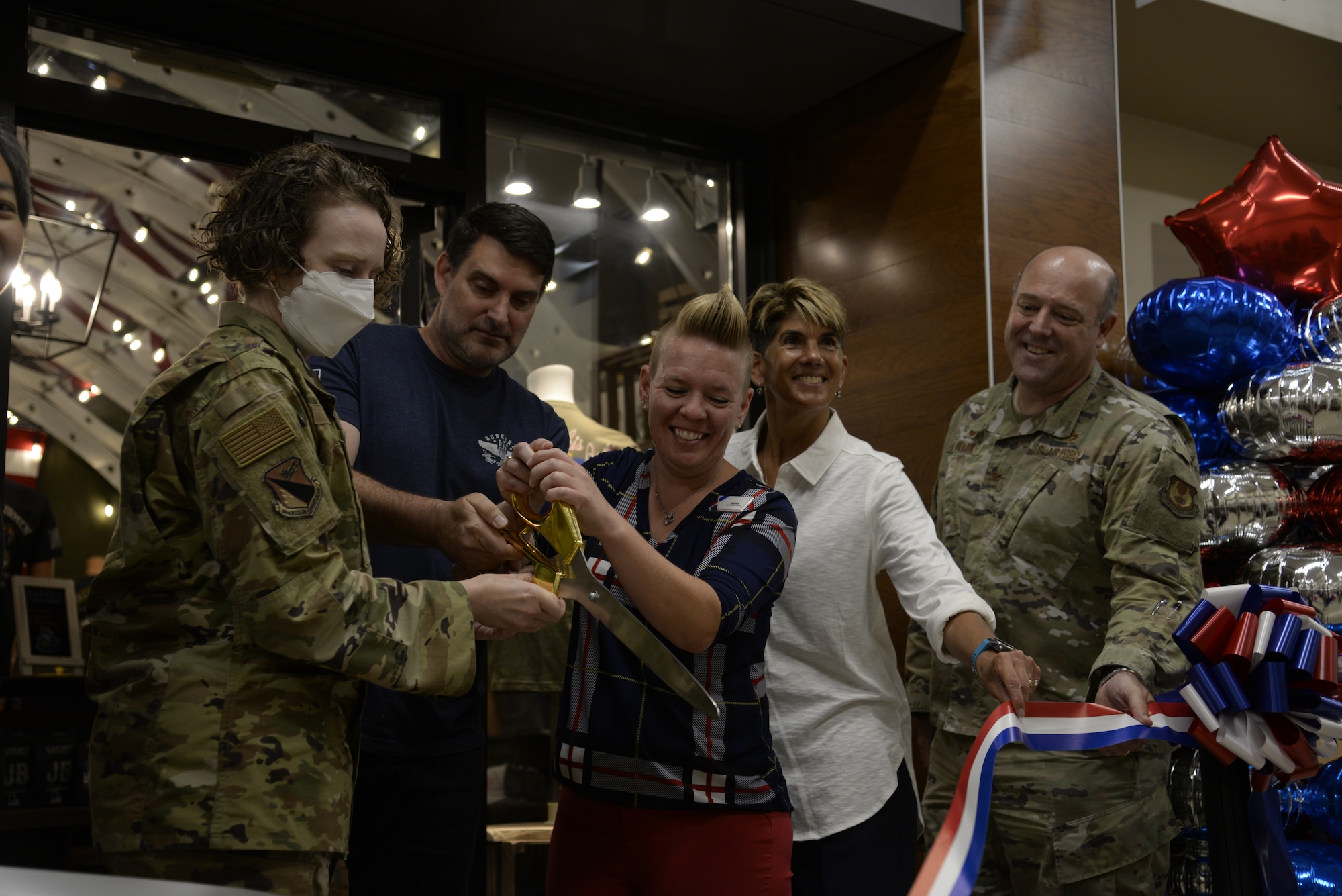 From left: Col. Sirena Morris, 88th Mission Support Group commander; Darren Moore, Bunker 27 founder and owner; Sarah Bateman, Base Exchange services business manager; Elizabeth Goodman-Bluhm, the Army & Air Force Exchange Service’s Central Region vice president; and Col. Patrick Miller, 88th Air Base Wing and installation commander, cut the ribbon July 15 on the new Bunker 27 at Wright-Patterson Air Force Base. (U.S Air Force photo by Airman 1st Class Jack Gardner)
