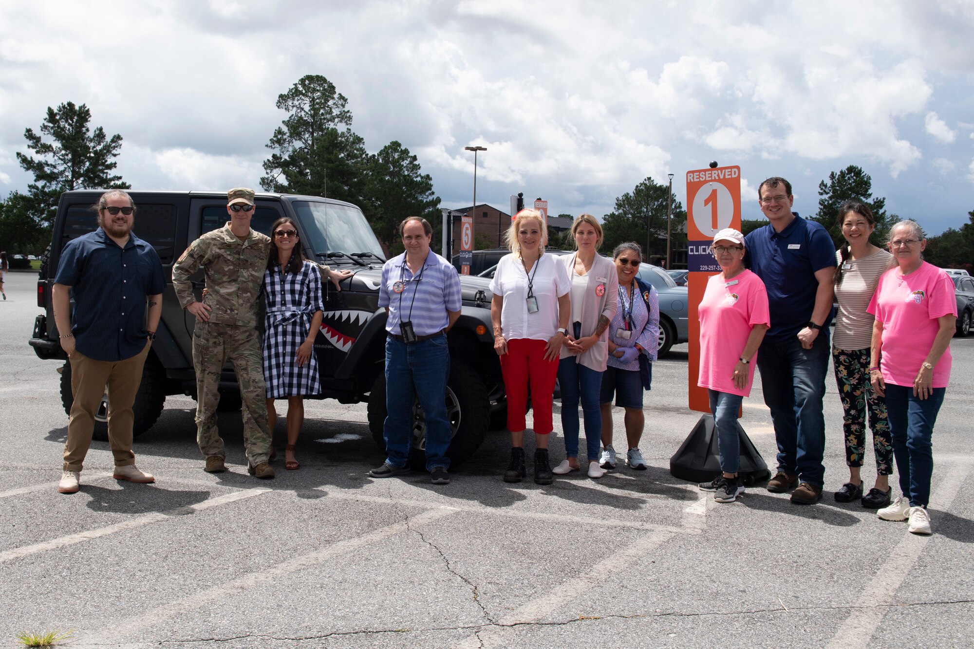 Photo of DoD cardholders posing for a photo