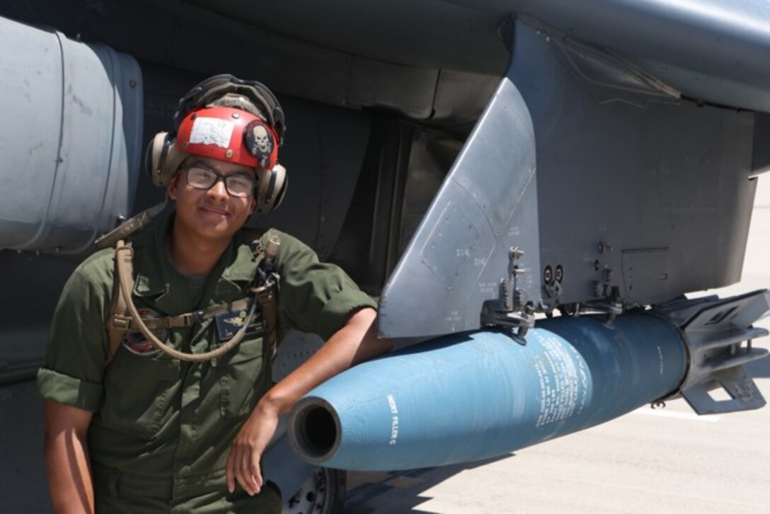 U.S. Marine Corps Lance Cpl. Justin Fontalvo, an aviation ordnance technician with Marine Attack Training Squadron (VMAT) 203, poses for a photo at Marine Corps Air Station Yuma, Arizona, July 20, 2021. “Leaders must be close to relate to others,” said Fontalvo, a native of Piscataway, New Jersey. According to his leadership, Fontalvo has shown the utmost respect towards his seniors and subordinates, he takes the initiative in sharing his knowledge regarding his military occupational specialty with other Marines in the unit to further the success of the ordnance division in the squadron. VMAT-203 is subordinate unit of 2nd Marine Aircraft Wing, the aviation combat element of II Marine Expeditionary Force. (U.S. Marine Corps photo by Lance Cpl. Christopher Hernandez)