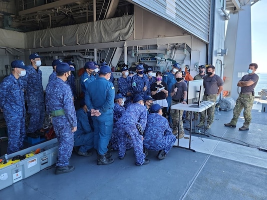 MUTSU BAY(July 19, 2021)- Members of the Japan Maritime Self-Defense Force (JMSDF) and the U.S. Navy participate in improvised explosive device training  during 2JA Mine Warfare Exercise (MIWEX) in Japan’s Mutsu Bay. 2JA MIWEX is an annual bilateral exercise between the U.S. Navy and Japan Maritime Self-Defense Force to strengthen interoperability and increase proficiency in mine countermeasure operations