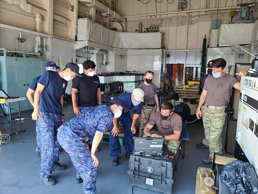 MUTSU BAY (July 19, 2021)- - Members of the Japan Maritime Self-Defense Force (JMSDF) and the U.S. Navy participate in improvised explosive device training  during 2JA Mine Warfare Exercise (MIWEX) in Japan’s Mutsu Bay. 2JA MIWEX is an annual bilateral exercise between the U.S. Navy and Japan Maritime Self-Defense Force to strengthen interoperability and increase proficiency in mine countermeasure operations