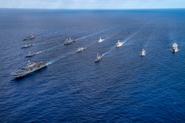 From left the Henry J. Kaiser-class underway replenishment oiler USNS Rappahannock (T-AO 204), and multinational steam in formation during Talisman Sabre (TS) 21.