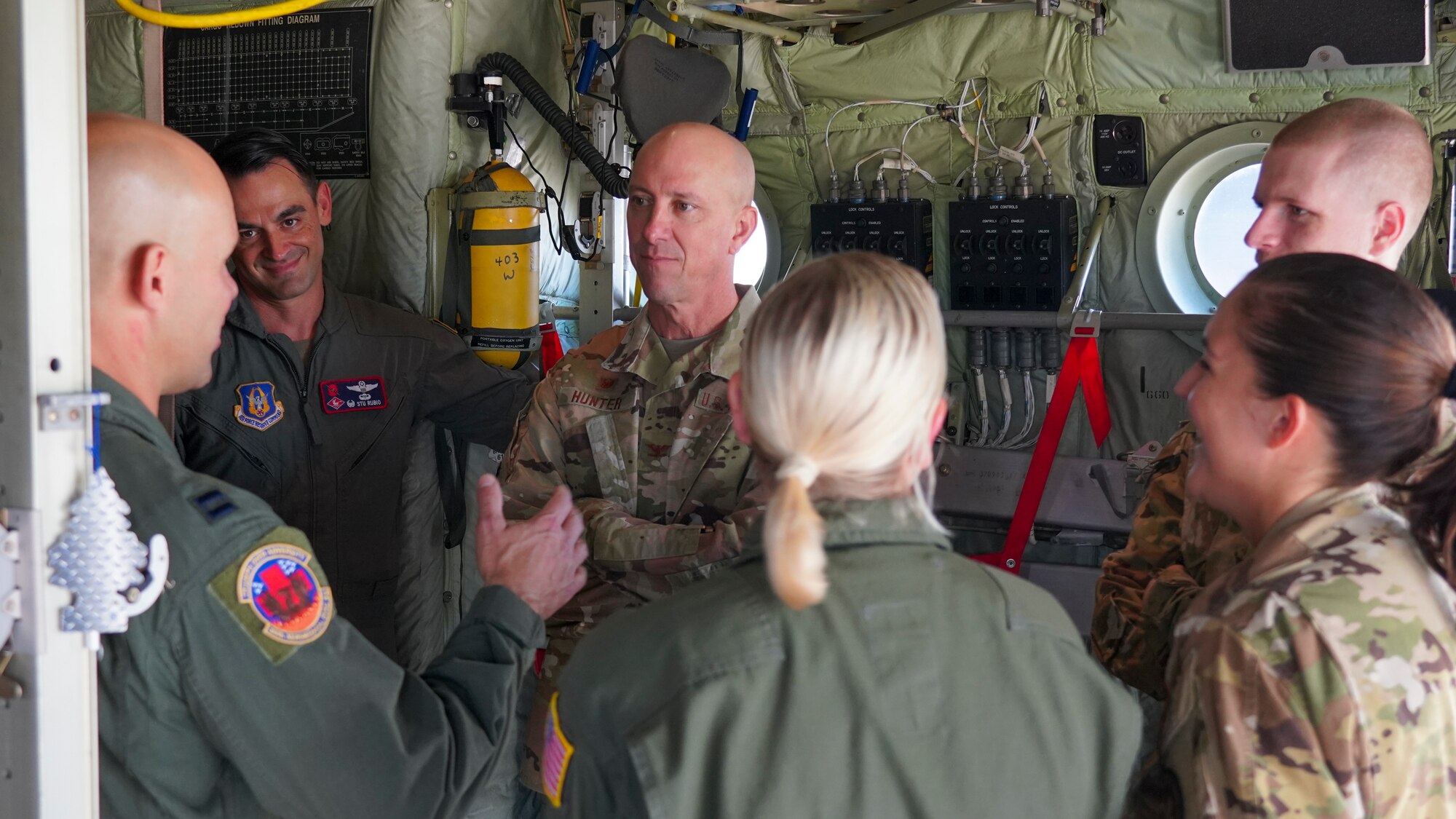 Capt. Matthew Allen, 36th Aeromedical Evacuation Squadron flight nurse, briefs Col. William Hunter, 81st Training Wing commander, about the capabilities and mission of the AES at Keesler Air Force Base, Miss., July 22, 2021. Hunter met with the Airmen of the 403rd Wing as part of his immersion tour to learn more about the Reserve mission and he also emphasized Total-Force partnerships on Keesler. (U.S. Air Force photo by 2nd Lt. Christopher Carranza)