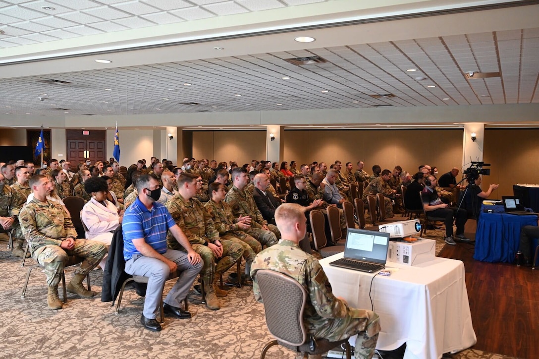 Airmen and civilian personnel attend the 88th Air Base Wing commander’s quarterly all-call July 22 at the Wright-Patterson Club. The event was also broadcast virtually for others across base. (U.S. Air Force photo by R.J. Oriez)
