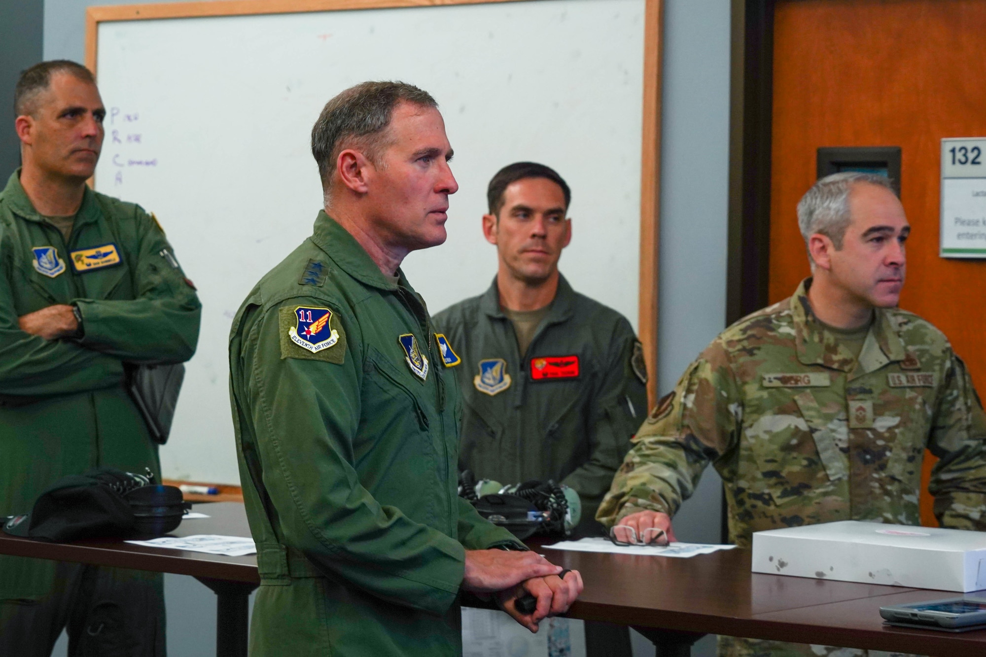 U.S. Air Force Lt. Gen. David A. Krumm, commander of Alaskan North American Aerospace Defense Command Region, Alaskan Command, and Eleventh Air Force, watches the Pacific Air Forces C-17 Demonstration Team conduct training operations at Marine Corps Base Hawaii, during his visit with Airmen assigned to Joint Base Pearl Harbor-Hickam, Hawaii, July 20, 2021.  Krumm visited several squadrons around the 15th Wing to gain an in-depth exposure to their unique mission and how the wing contributes to the Indo-Pacific region’s security and stability. (U.S. Air Force photo by Airman 1st Class Makensie Cooper)
