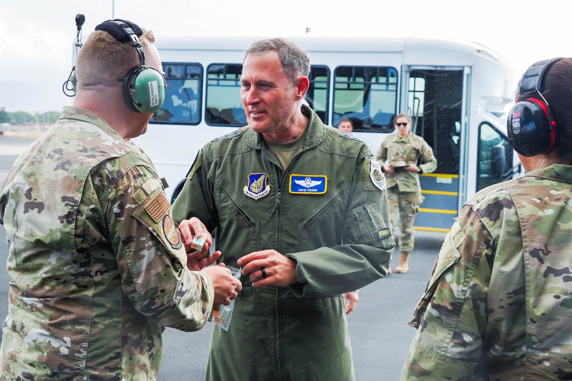 U.S. Air Force Lt. Gen. David A. Krumm, commander of Alaskan North American Aerospace Defense Command Region, Alaskan Command, and Eleventh Air Force, watches the Pacific Air Forces C-17 Demonstration Team conduct training operations at Marine Corps Base Hawaii, during his visit with Airmen assigned to Joint Base Pearl Harbor-Hickam, Hawaii, July 20, 2021.  Krumm visited several squadrons around the 15th Wing to gain an in-depth exposure to their unique mission and how the wing contributes to the Indo-Pacific region’s security and stability. (U.S. Air Force photo by Airman 1st Class Makensie Cooper)