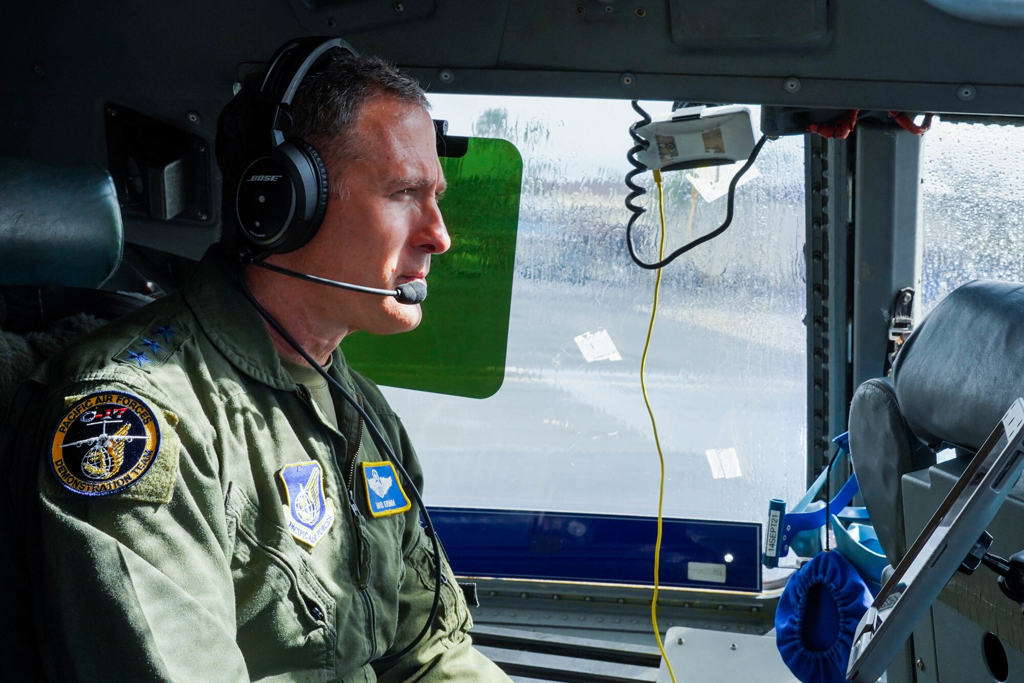 U.S. Air Force Lt. Gen. David A. Krumm, commander of Alaskan North American Aerospace Defense Command Region, Alaskan Command, and Eleventh Air Force, watches the Pacific Air Forces C-17 Demonstration Team conduct training operations at Marine Corps Base Hawaii, during his visit with Airmen assigned to Joint Base Pearl Harbor-Hickam, Hawaii, July 20, 2021.  Krumm visited several squadrons around the 15th Wing to gain an in-depth exposure to their unique mission and how the wing contributes to the Indo-Pacific region’s security and stability. (U.S. Air Force photo by Airman 1st Class Makensie Cooper)