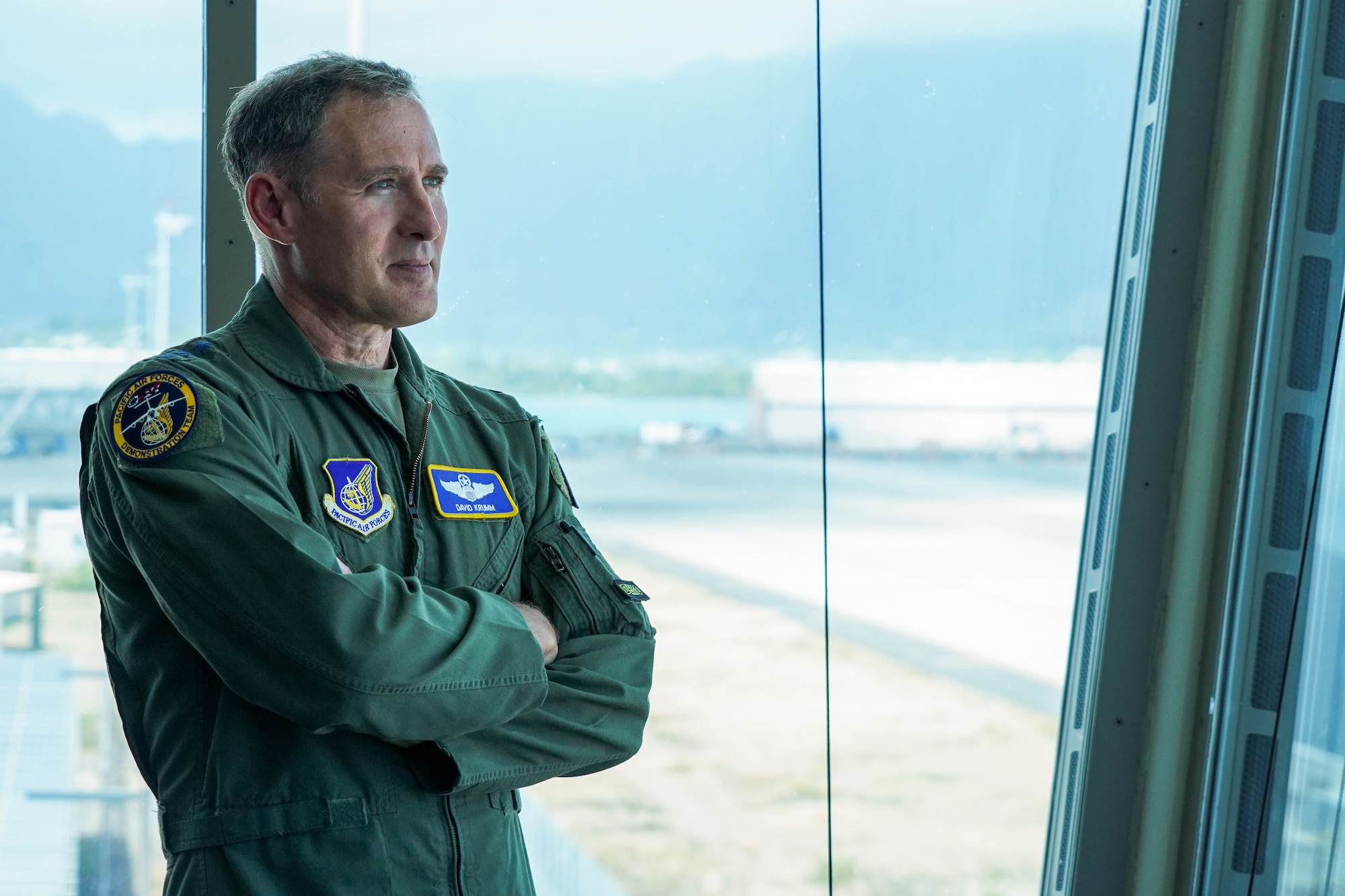 U.S. Air Force Lt. Gen. David A. Krumm, commander of Alaskan North American Aerospace Defense Command Region, Alaskan Command, and Eleventh Air Force, watches the Pacific Air Forces C-17 Demonstration Team conduct training operations at Marine Corps Base Hawaii, during his visit with Airmen assigned to Joint Base Pearl Harbor-Hickam, Hawaii, July 20, 2021.  Krumm visited several squadrons around the 15th Wing to gain an in-depth exposure to their unique mission and how the wing contributes to the Indo-Pacific region’s security and stability. (U.S. Air Force photo by Airman 1st Class Makensie Cooper)