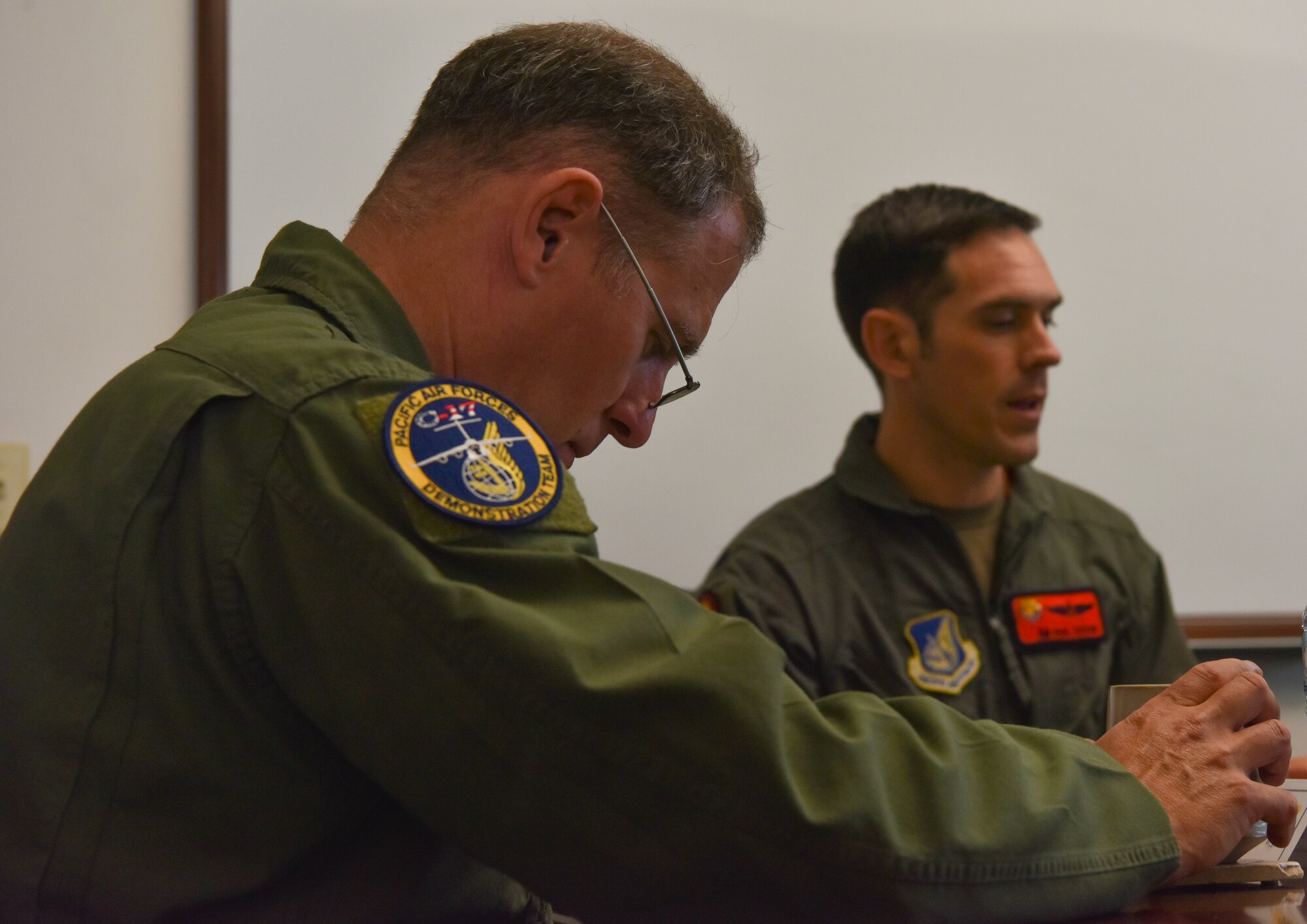 U.S. Air Force Lt. Gen. David A. Krumm, commander of Alaskan North American Aerospace Defense Command Region, Alaskan Command, and Eleventh Air Force, talks with Airmen assigned to the 15th Wing during a visit to Joint Base Pearl Harbor-Hickam, Hawaii, July 20, 2021.  Krumm visited several squadrons around the 15th Wing to gain an in-depth exposure to their unique mission and how the wing contributes to the Indo-Pacific region’s security and stability. (U.S. Air Force photo by Tech. Sgt. Anthony Nelson Jr.)