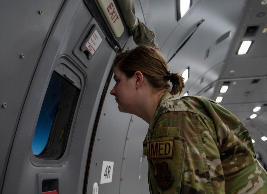 Captain Kelly Dering views Fighting Falcon