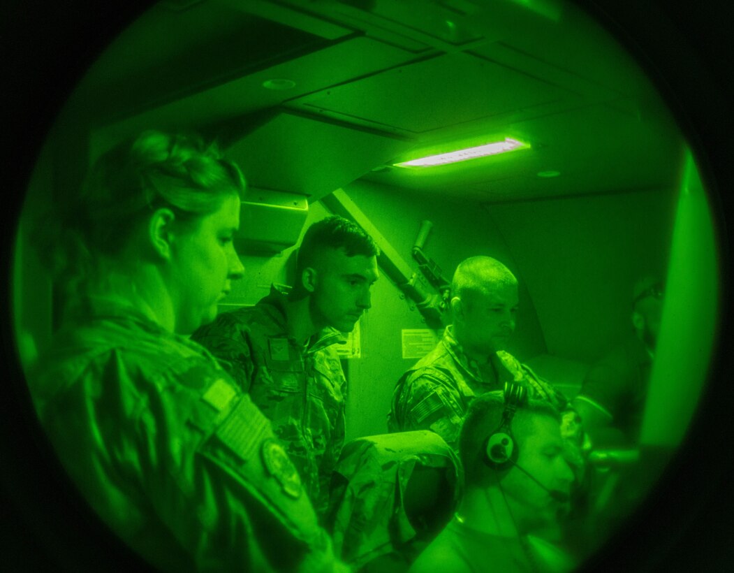 Airmen observe F-16 Fighting Falcon refueling