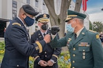 Brig. Gen. William L. Thigpen (left), U.S. Army South commanding general, meets Gral. Eduardo Enrique Zapateiro Altamiranda (right), Colombian National Army commanding general, July 21 in Bogotá, Colombia.