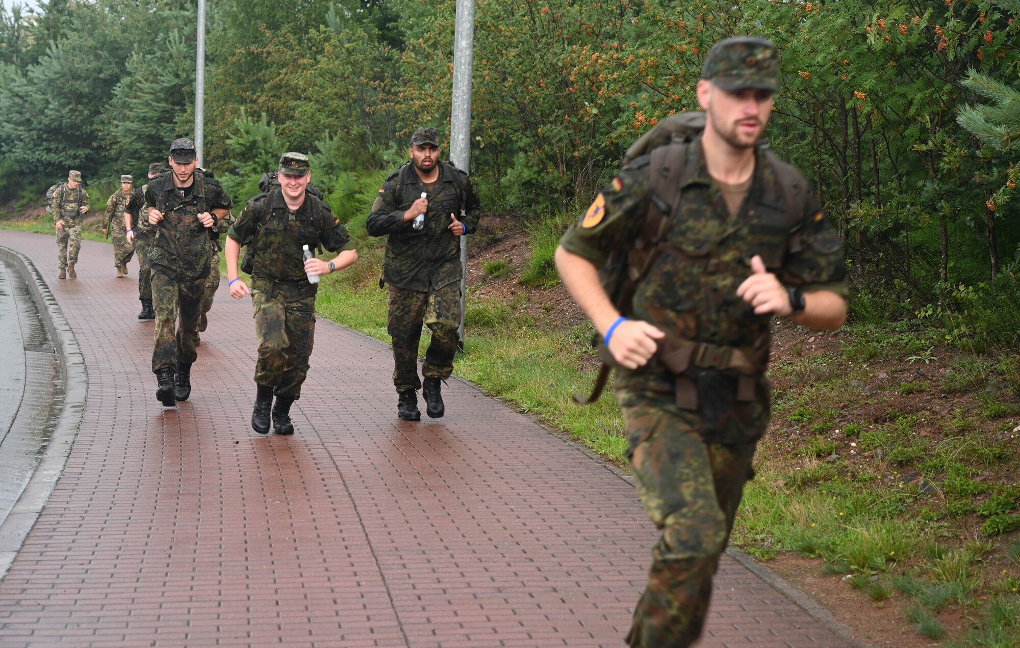 Cadets from the German Luftwaffe participate in the 6th Annual Chief Master Sgt. Of the Air Force Paul Airey Memorial Ruck at Ramstein Air Base, Germany, July 16, 2021. The cadets visited Ramstein to build partnerships and expand their knowledge of U.S. Air Force aircraft as well as their own. (U.S. Air Force photo by Senior Airman Thomas Karol)