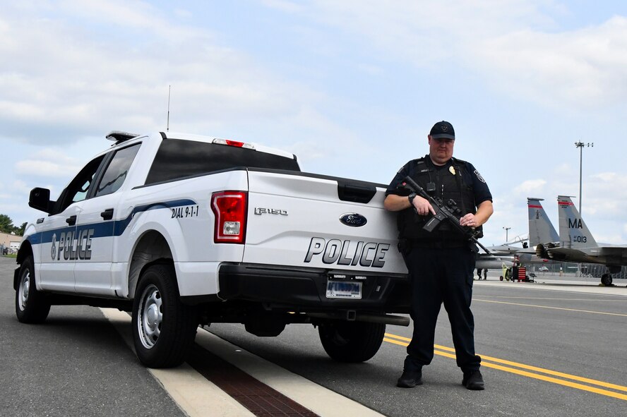 Officer Robert Keeler, 104th Fighter Wing Installation Security Officer, poses for a photo July 21, 2021, at Barnes Air National Guard Base, Massachusetts. Keeler works with other civilian officers and military defenders to ensure safety on base.  (U.S. Air National Guard photo by  Sara Kolinski)