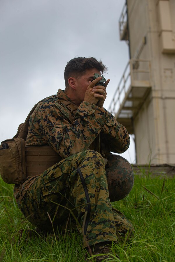 U.S. Marine Corps Lance Cpl. Sayediman Sadrhajsayedjavadi, a fire support Marine with 2d Battalion, 10th Marine Regiment, 2d Marine Division (MARDIV), locates grid coordinates for fire missions as part of a Marine Corps Combat Readiness Evaluation (MCCRE) for 2d Battalion, 6th Marine Regiment, 2d MARDIV, on Camp Lejeune, N.C., July 20, 2021.