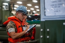 Marines and Sailors with the II Marine Expeditionary Force Maritime DSCA Task Force, commanded by Combat Logistics Battalion 22, and Sailors aboard the USS Arlington conducted a destructive weather mission rehearsal loading exercise to prepare and rehearse for a future DSCA mission during the 2021 hurricane season.