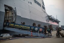 Marines and Sailors with the II Marine Expeditionary Force Maritime DSCA Task Force, commanded by Combat Logistics Battalion 22, and Sailors aboard the USS Arlington conducted a destructive weather mission rehearsal loading exercise to prepare and rehearse for a future DSCA mission during the 2021 hurricane season.