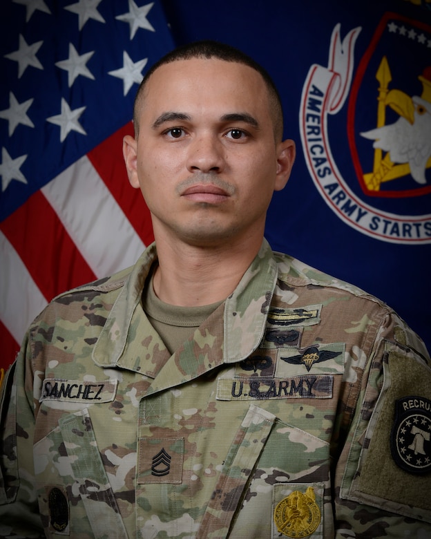 man standing in front of flags