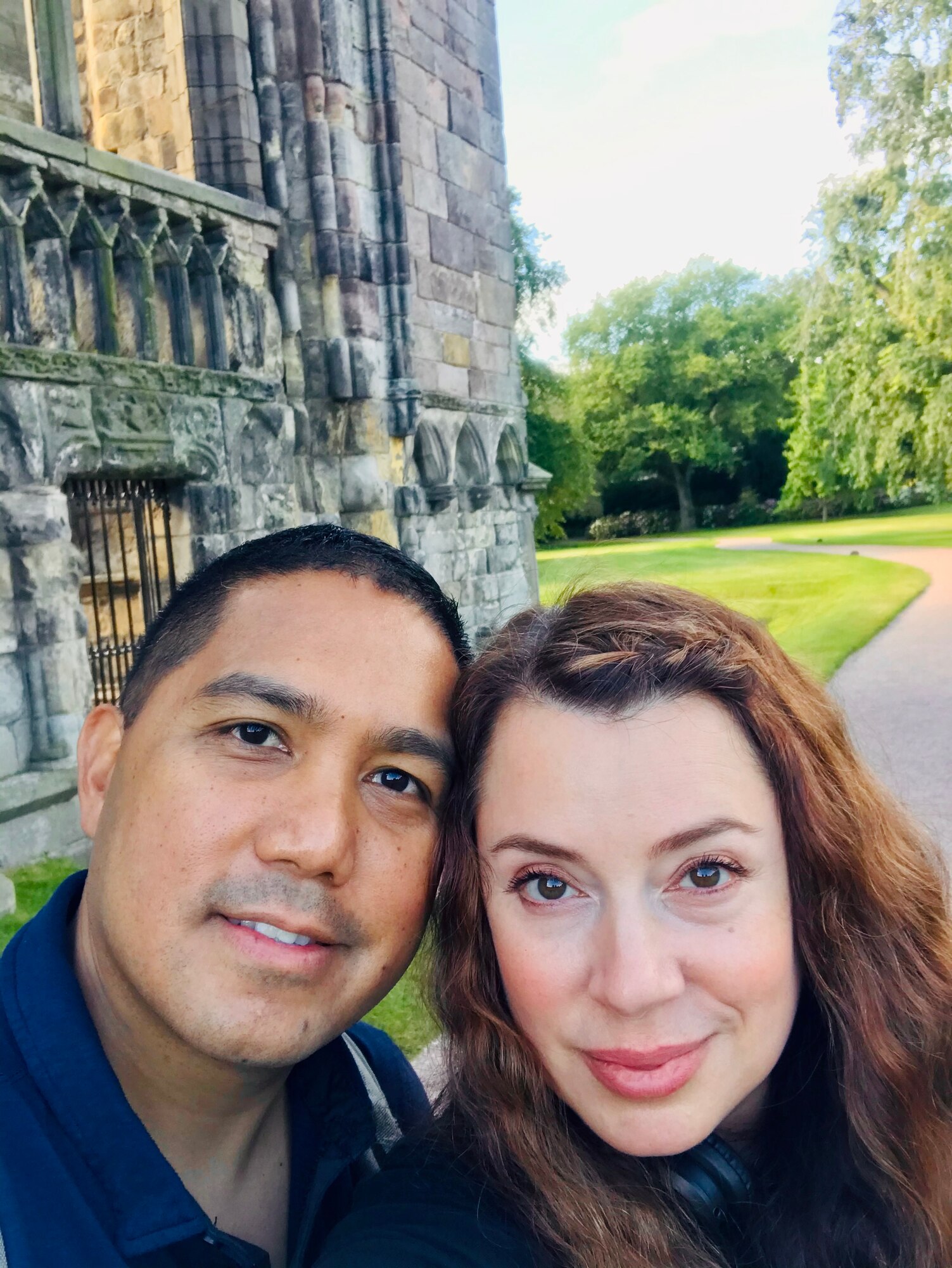 U.S. Air Force Lt. Dino Quijano, 422nd Medical Squadron commander, poses for a photo with his spouse, Michelle, at the Holyrood Palace, Edinburgh, Scotland, Sept. 2020. (Courtesy photo)