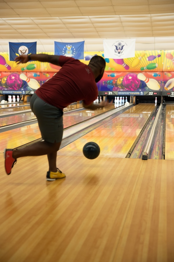 U.S. Marines and Sailors with 2nd Marine Logistics Group participate in the Commander’s Cup bowling tournament on Camp Lejeune, North Carolina, July 20, 2021.  Combat Logistics Regiment 2 held the event to promote friendly competition and camaraderie. (U.S. Marine Corps photo by Lance Cpl. Zachary Zephir)