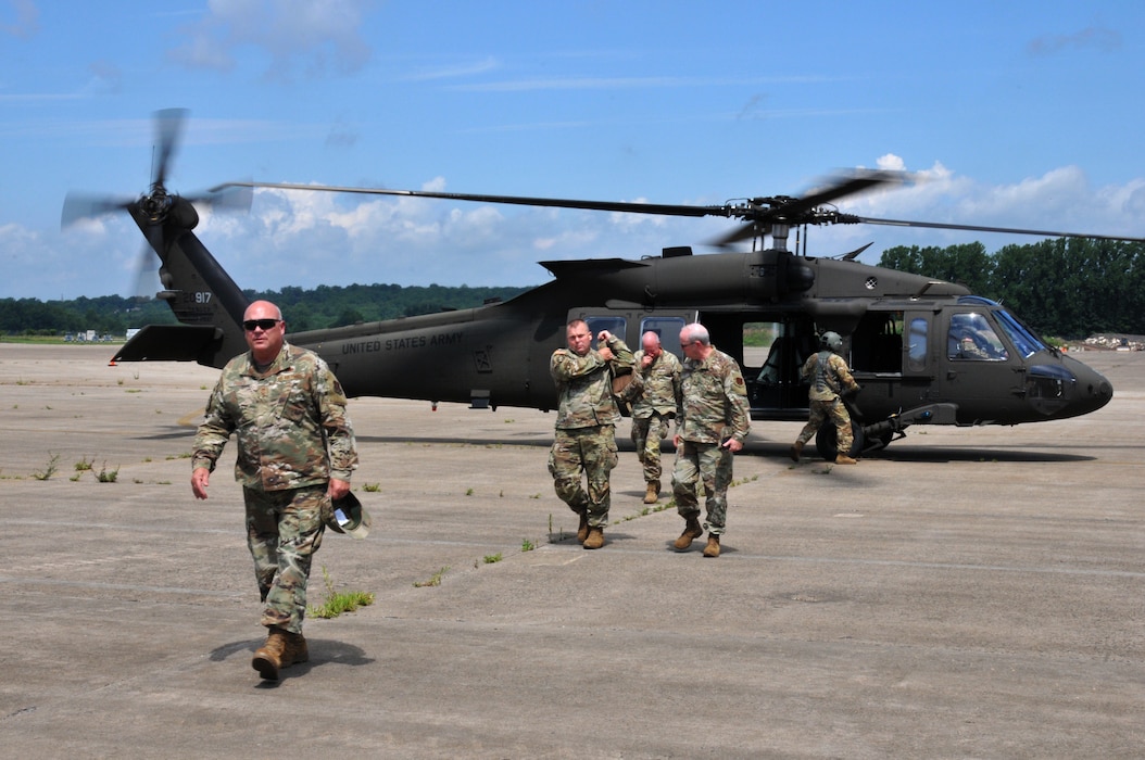 Senior leadership for the Pennsylvania National Guard deboard a UH-60 Black Hawk helicopter after landing at Biddle Air National Guard Base in Horsham, Pennsylvania, July 14, 2021.