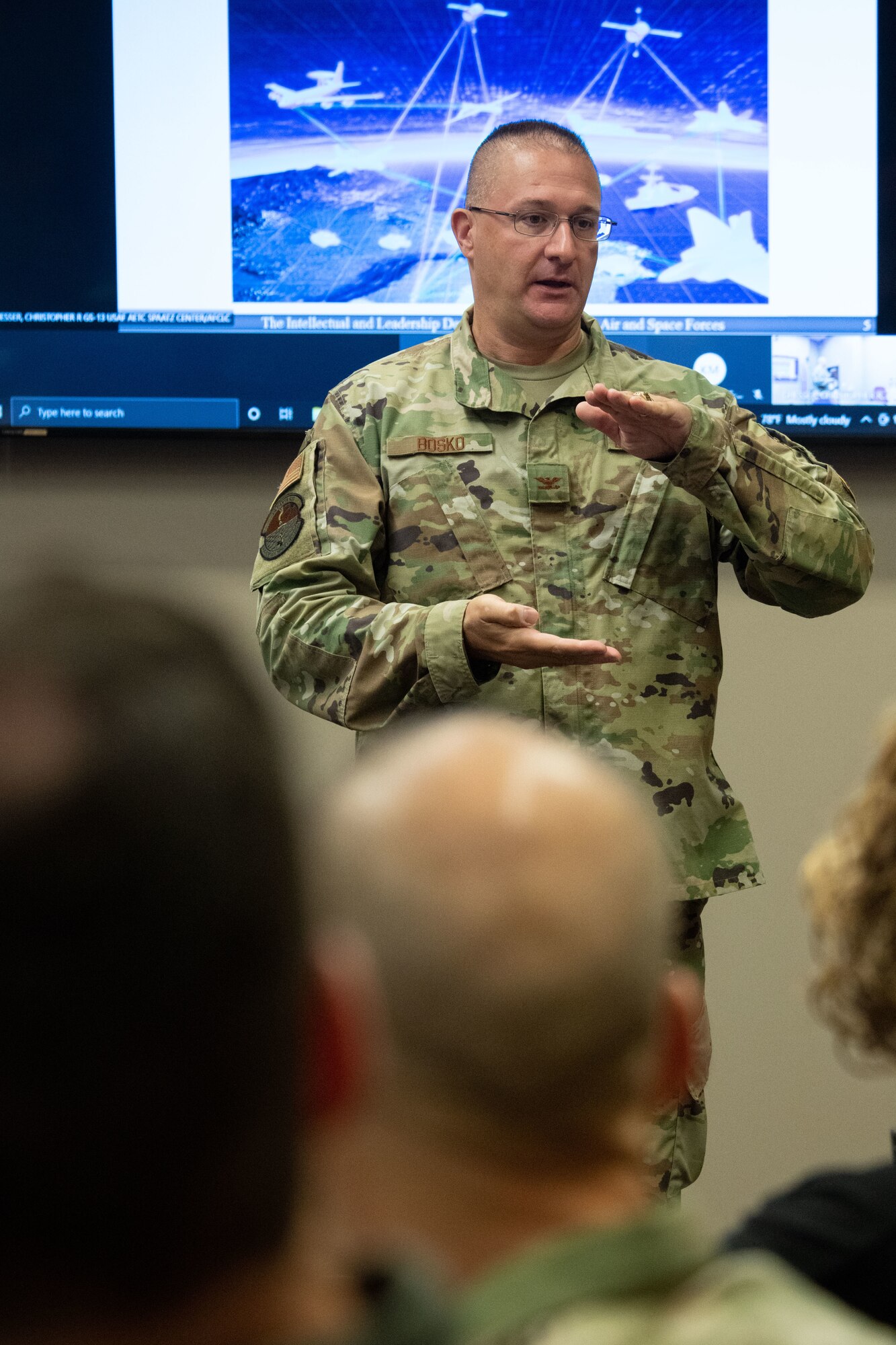 Col. David Bosko, commandant, Air Force Cyber College, leads a discussion with Air Force and Space Force Language Enabled Airmen Program scholars attending the Cyber Language Intensive Training Event course, July 22, 2021, Maxwell Air Force Base, Ala. Cyber LITE is a strategic competition course co-sponsored by the Air Force Culture and Language Center and Air Force Cyber College for advanced language proficiency LEAP scholars who have career-related ties to cyber operations or an academic background in cyber studies.