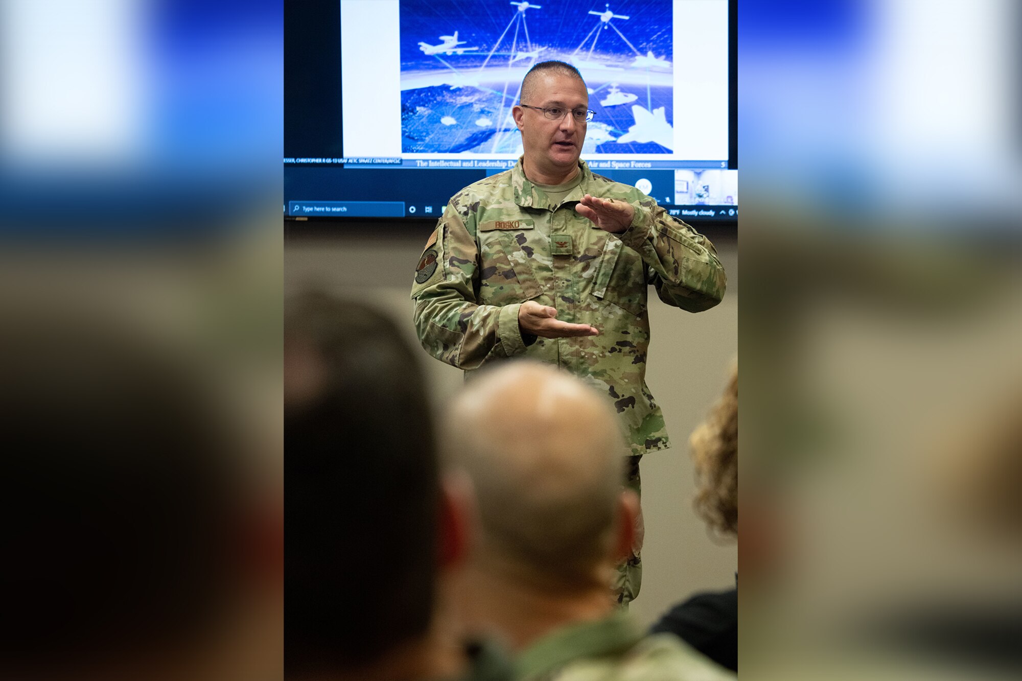 Col. David Bosko, commandant, Air Force Cyber College, leads a discussion with Air Force and Space Force Language Enabled Airmen Program scholars attending the Cyber Language Intensive Training Event course, July 22, 2021, Maxwell Air Force Base, Ala. Cyber LITE is a strategic competition course co-sponsored by the Air Force Culture and Language Center and Air Force Cyber College for advanced language proficiency LEAP scholars who have career-related ties to cyber operations or an academic background in cyber studies. (U.S. Air Force photo by Melanie Rodgers Cox)