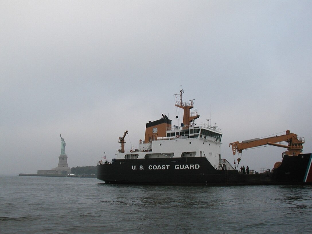 The USCGC Juniper steams past the Statue of Liberty on 09/11.