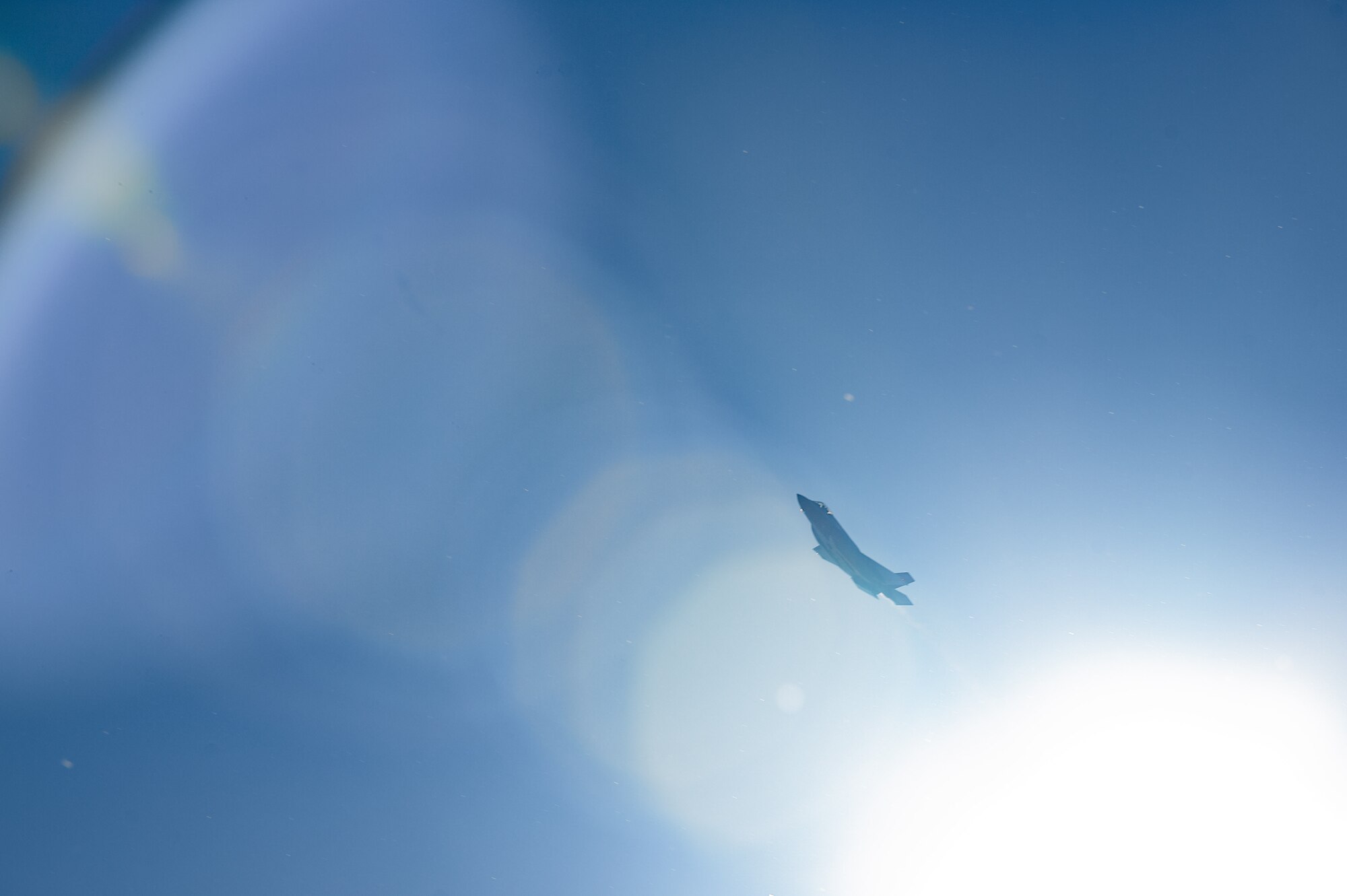 An F-35A Lightning II assigned to the 354th Fighter Wing (FW) flies over Eielson Air Force Base, Alaska, during an Agile Combat Employment (ACE) exercise July 12, 2021. The 354th FW applied ACE concepts to become more agile in mission execution, strategic deterrence, and more capable in generating an increased number of sorties with a minimal footprint from a simulated austere environment. (U.S. Air Force photo by Airman 1st Class Jose Miguel T. Tamondong)