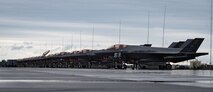 Twenty F-35A Lightning II aircraft assigned to the 354th Fighter Wing (FW) wait to be refueled  during an Agile Combat Employment (ACE) exercise on Eielson Air Force Base, Alaska, July 14, 2021. The 354th FW applied ACE concepts to become more agile in mission execution, strategic deterrence, and more capable in generating an increased number of sorties with a minimal footprint from a simulated austere environment. (U.S. Air Force photo by Airman 1st Class Jose Miguel T. Tamondong)