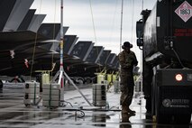 U.S. Air Force Airman 1st Class Luther Taylor, a 354th Logistics Readiness Squadron fuels distribution apprentice, refuels an F-35A Lightning II assigned to the 354th Fighter Wing (FW) during an Agile Combat Employment (ACE) exercise on Eielson Air Force Base, Alaska, July 14, 2021. The 354th FW applied ACE concepts to become more agile in mission execution, strategic deterrence, and more capable in generating an increased number of sorties with a minimal footprint from a simulated austere environment. (U.S. Air Force photo by Airman 1st Class Jose Miguel T. Tamondong)