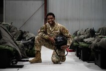 U.S. Air Force Senior Airman Michael McCaskill, a 354th Operations Support Squadron craftsman, poses for a photo during an Agile Combat Employment (ACE) exercise on Eielson Air Force Base, Alaska, July 15, 2021. The 354th FW conducted a local exercise from a simulated austere location to test its ability to generate airpower quickly, efficiently and repeatedly. (U.S. Air Force photo by Airman 1st Class Jose Miguel T. Tamondong)