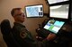 Maj. Gen. Craig D. Wills, 19th Air Force commander, flies an MQ-9 Reaper simulator, July 20, 2021, on Holloman Air Force Base, N.M. The command team held three all-calls with the wing, and spoke on the importance of training, readiness and how our Airmen give the U.S. Air Force a competitive edge in our fight against U.S. adversaries. (U.S. Air Force photo by Staff Sgt. Christopher S. Sparks)