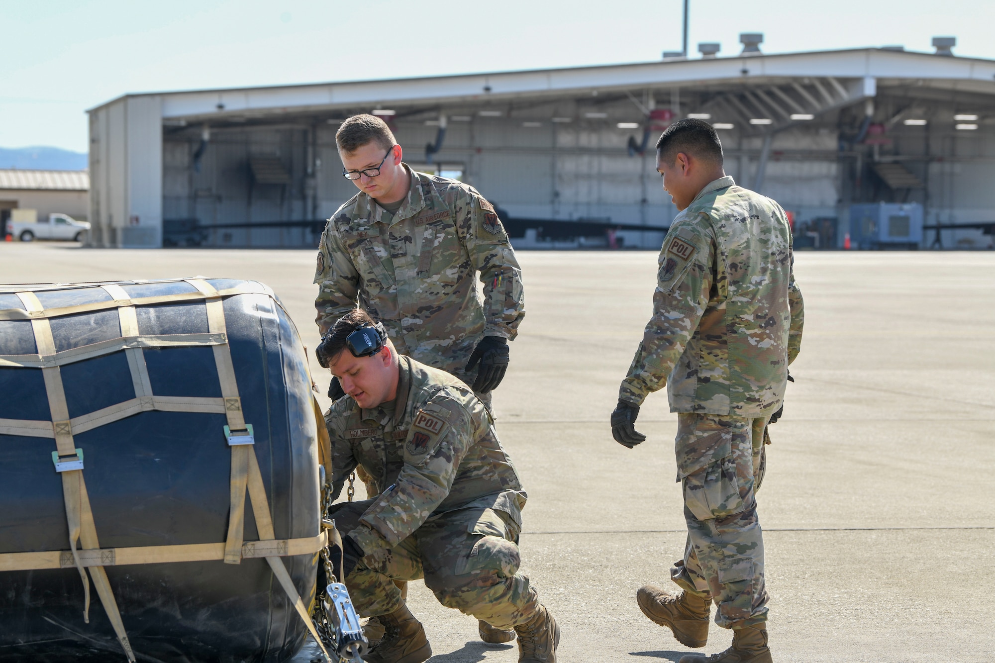 9th Logistics Readiness Squadron Immediate Response Force team members prepare to test the Tactical Aviation Ground Refueling System (TAGRS) during an exercise, July 9, 2021, at Beale Air Force Base, California.