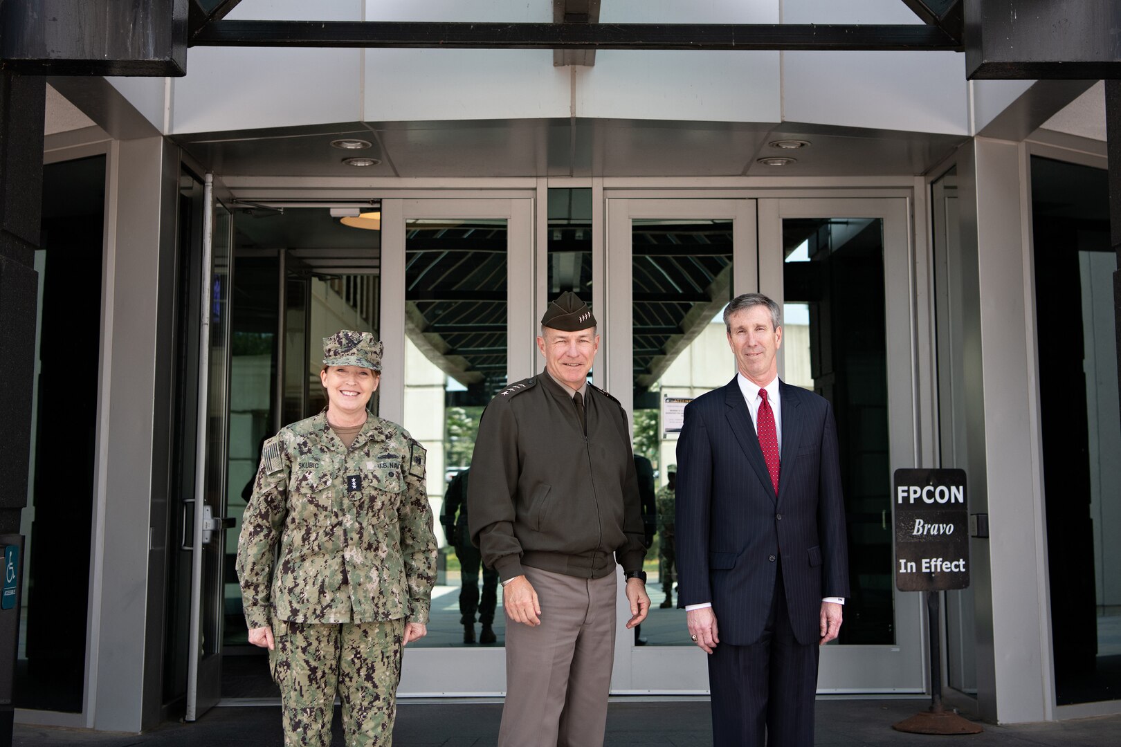 Vice Admiral Michelle Skubic, Director, Defense Logistics Agency (DLA) (left) and Dr. Rhys M. Williams, Acting Director, Defense Threat Reduction Agency (DTRA) (right) greet General James C. McConville, Chief of Staff of the U.S. Army in front of DLA headquarters prior to   the retirement ceremony for Mr. Michael L. Bruhn, SES, Senior Executive Advisor, Defense Threat Reduction Agency.
