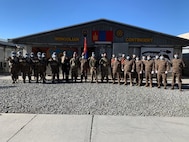 Alaska Army National Guard Capt. Jessica Miller and Sgt. 1st Class Juan Restrepo spend time with their Mongolian counterparts during the last rotation of the Mongolian Expeditionary Task Force liaison program in New Kabul Compound, Afghanistan, December 2020 - July 2021. This program started in 2003 shortly after the country was selected for Alaska’s state partnership program, and finally came to an end in 2021 when the camp was signed over to the Afghan Army, the METF returned to Mongolia, and the Alaska National Guardsmen returned to Alaska. (Courtesy photo)