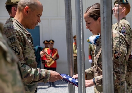 Alaska Army National Guard Capt. Jessica Miller and Sgt. 1st Class Juan Restrepo spend time with their Mongolian counterparts during the last rotation of the Mongolian Expeditionary Task Force liaison program in New Kabul Compound, Afghanistan, December 2020 - July 2021. This program started in 2003 shortly after the country was selected for Alaska’s state partnership program, and finally came to an end in 2021 when the camp was signed over to the Afghan Army, the METF returned to Mongolia, and the Alaska National Guardsmen returned to Alaska. (Courtesy photo)