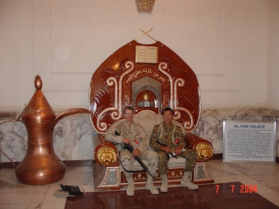 Lt. Col. Steve Wilson poses for a photo with one of his Mongolian counterparts in Iraq, July 7, 2004. Wilson was the first liaison to accompany the Mongolian Armed Forces on a deployment during the Global War on Terrorism as part of the state partnership program. The SPP is a program that links a state’s National Guard with the armed forces or equivalent of a partner country in a cooperative, mutually beneficial relationship.  (Courtesy photo)