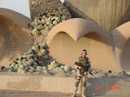 Lt. Col. Steve Wilson poses for a photo in Iraq, September 25, 2004. Wilson was the first liaison to accompany the Mongolian Armed Forces on a deployment during the Global War on Terrorism as part of the state partnership program. The SPP is a program that links a state’s National Guard with the armed forces or equivalent of a partner country in a cooperative, mutually beneficial relationship. (Courtesy photo)