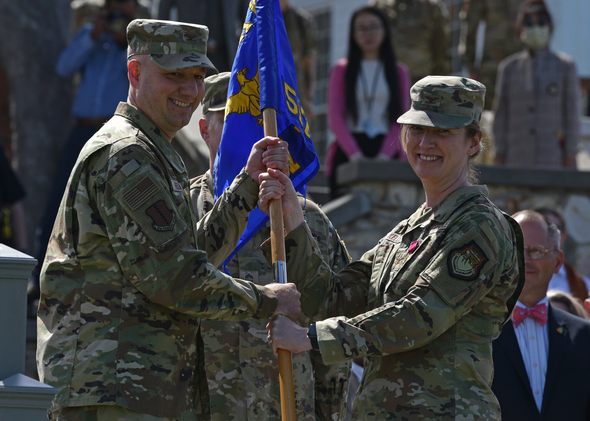 U.S. Air Force Col. Stephanie Kelley, 517th Training Group outgoing commander, relinquishes command to Col. Matthew Reilman, 17th Training Wing commander, during the 517th TRG change of command ceremony at the Presidio of Monterey, California, July 23, 2021. Kelley will be transferring to the Pentagon in Washington, D.C. (U.S. Air Force photo by Senior Airman Ashley Thrash)