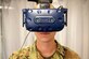 Air Force Staff Sgt. Renee Scherf, Detachment 23 curriculum engineer, MC-130H subject matter expert, dons virtual reality goggles. Members of Detachment 23’s Tech Training Transformation are part of Air Education and Training Command and responsible for re-engineering tech training. Their cutting-edge program utilizes virtual reality training systems and artificial intelligence, among other modalities, to transform the Airmen development process. (Photo by Air Force Staff Sgt. Keith James)